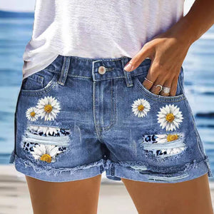 Floral high-waisted ripped denim shorts