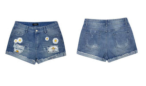 Floral high-waisted ripped denim shorts