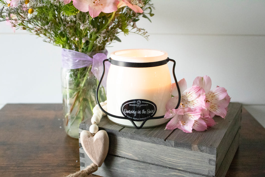 Dancing in the rain candle in 16 oz Butter creamery jar