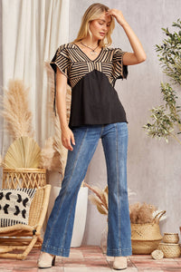 Babydoll knit top features v neckline  Black