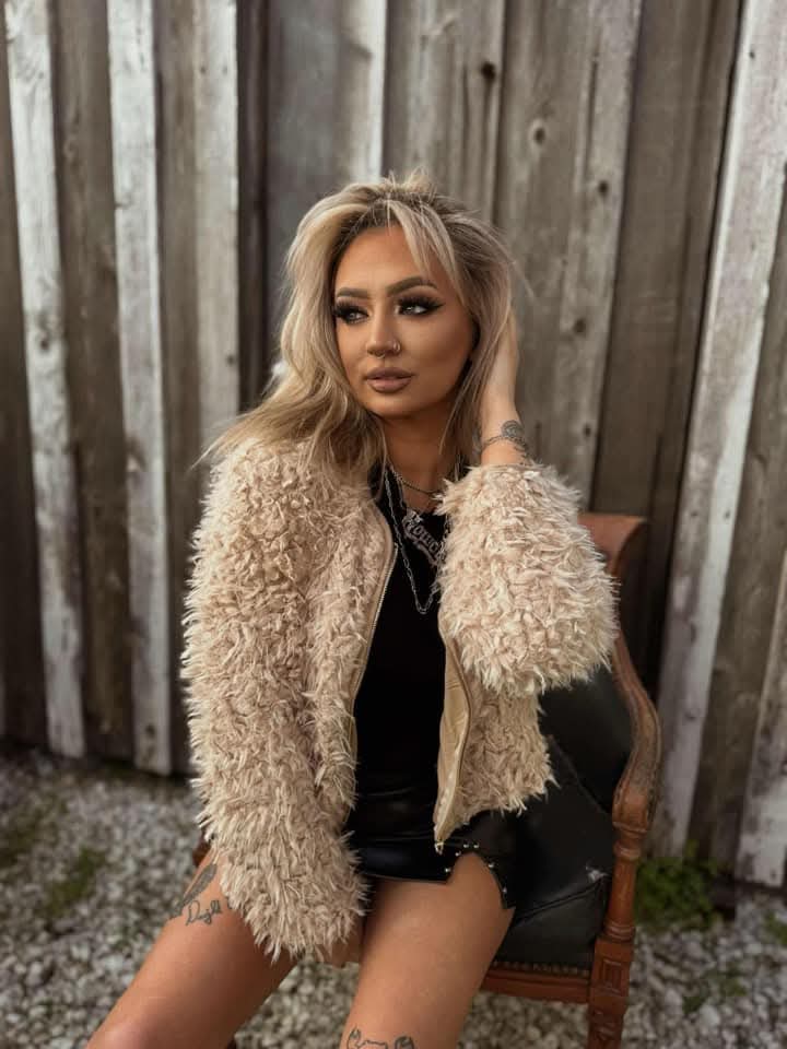 light weight faux fur sheep looking jacket in oatmeal