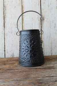 Antique punched tin candle melter